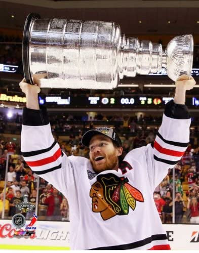Duncan Keith Chicago Blackhawks 2013 Stanley Cup Champions Raising Of The Cup Photo product image 1, provided for visual