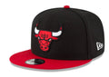 Youth Chicago Bulls 2-Tone Black/Red New Era 9FIFTY Snapback Hat product image 1, provided for visual reference and product