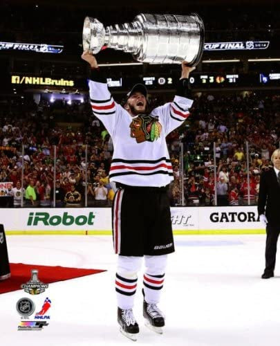 Jonathan Toews Chicago Blackhawks 2013 Stanley Cup Champions Raising Of The Cup Photo product image 1, provided for visual