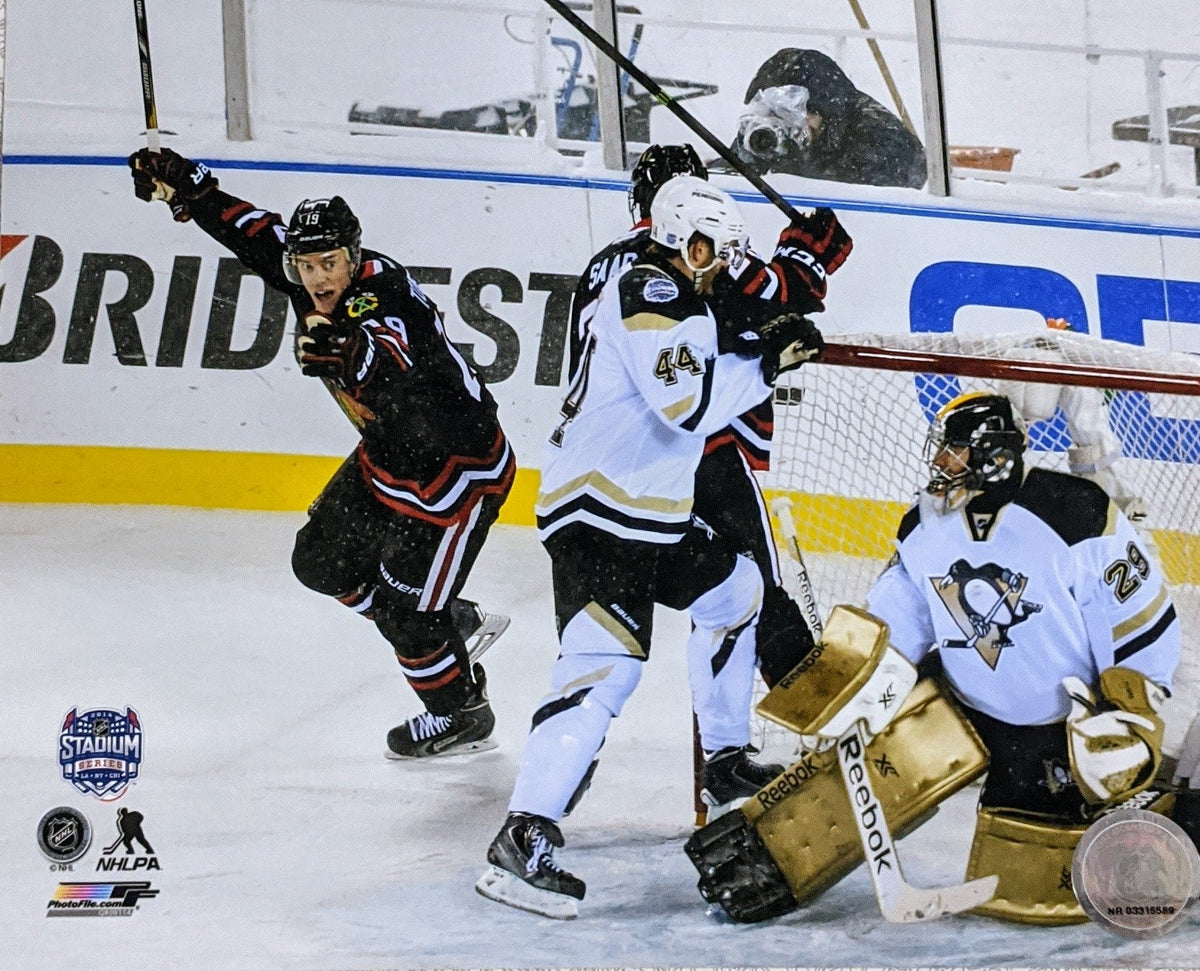Jonathan Toews Chicago Blackhawks 2014 NHL Stadium Series Action Photo (Size: 8X10) product image 1, provided for visual