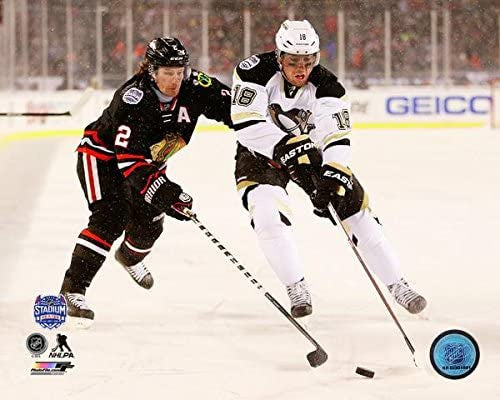 Duncan Keith Chicago Blackhawks & James Neal Pittsburgh Penguins 2014 NHL Stadium Series Action Photo product image 1,